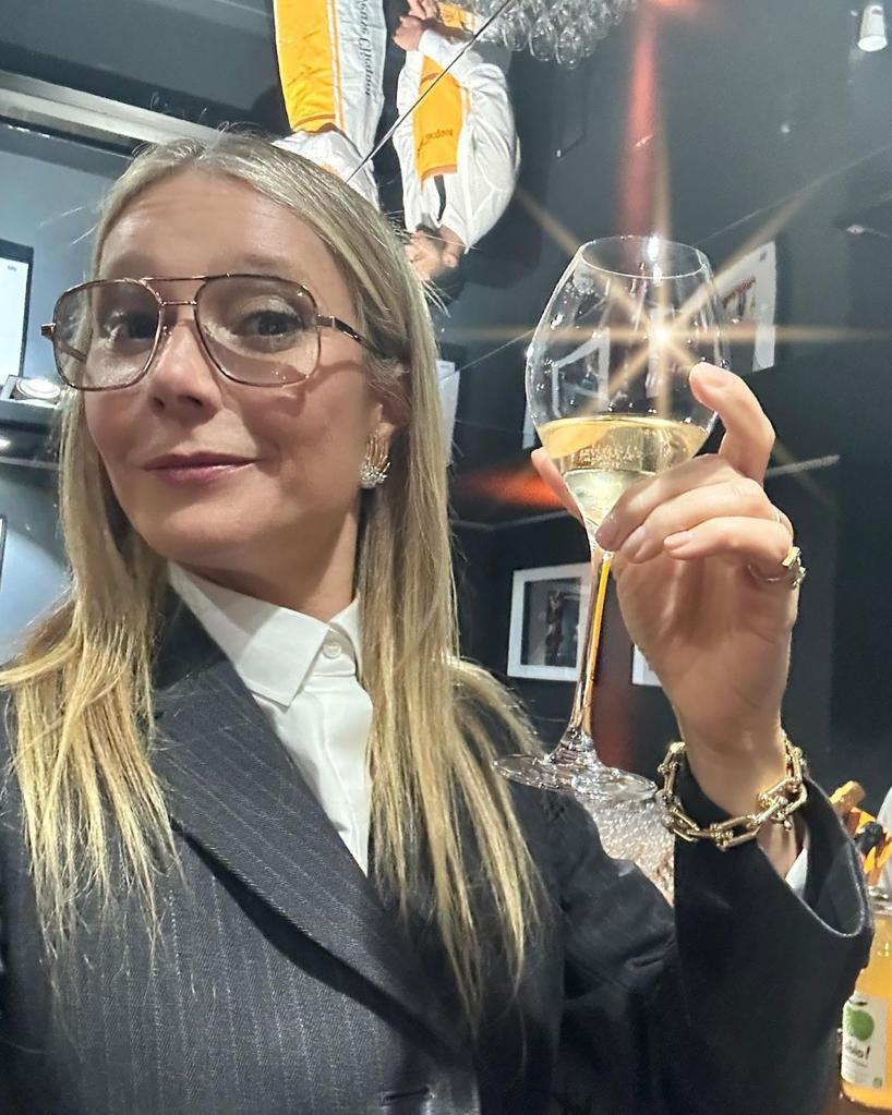 Gwyneth Paltrow holds wine glass