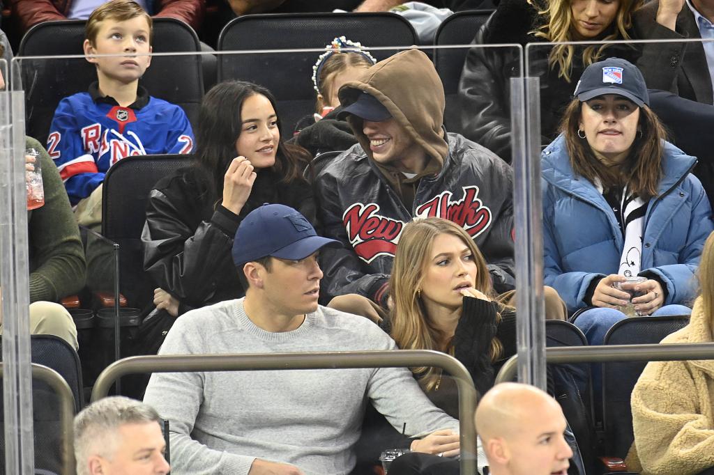 Pete Davidson with Chase Sui Wonders at a hockey game.