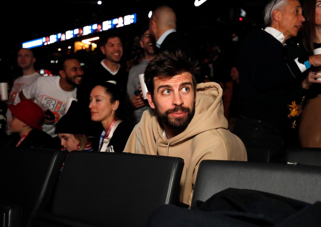 Gerard Piqué sits