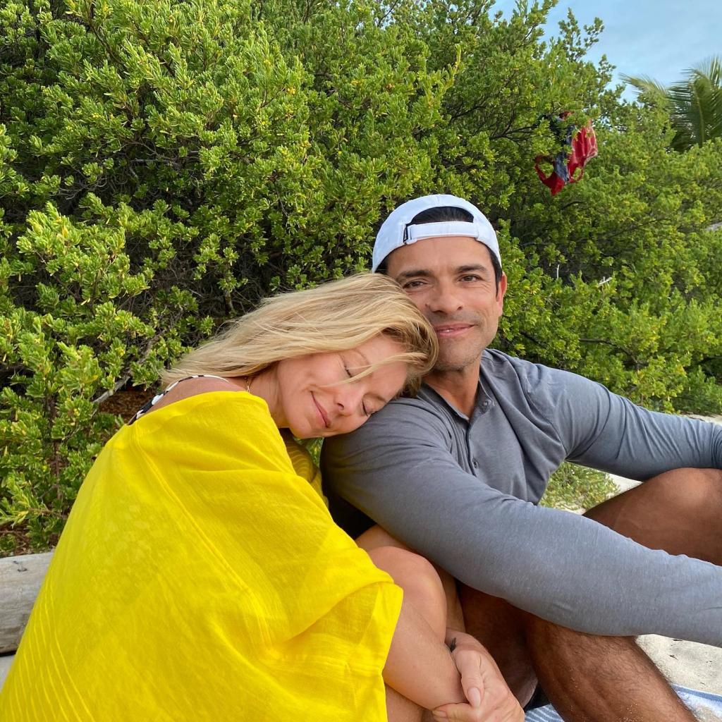 Kelly Ripa and Mark Consuelos cuddle