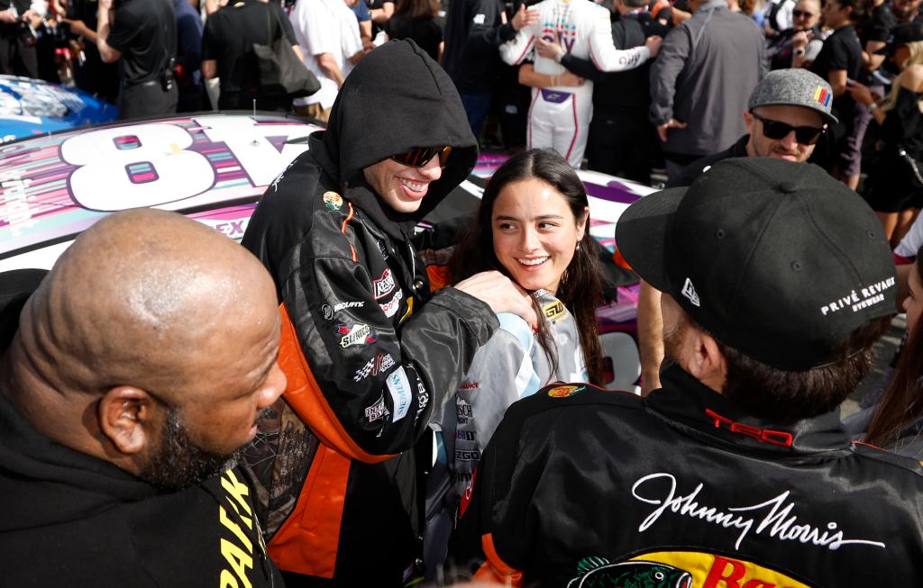 pete davidson with his arms around chase sui wonders at daytona