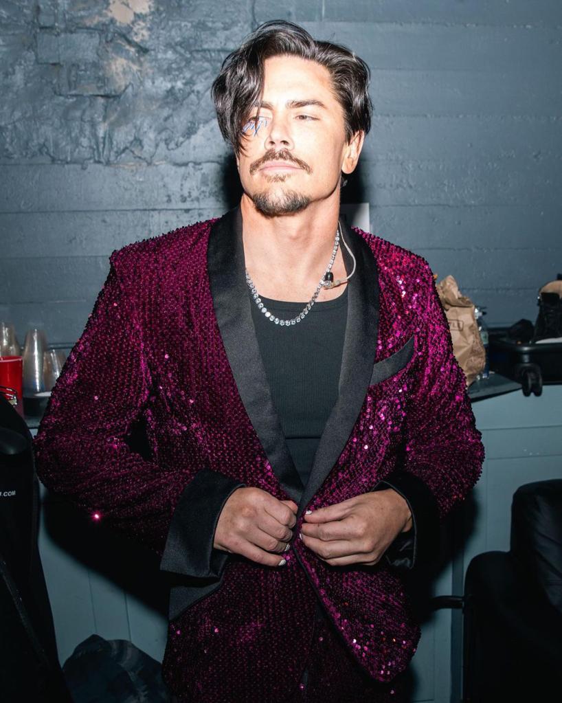 A photo of Tom Sandoval posing for a solo shot