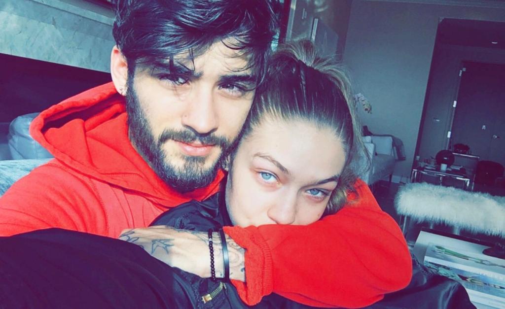 Zayn Malik hugs Gigi Hadid in red hoodie