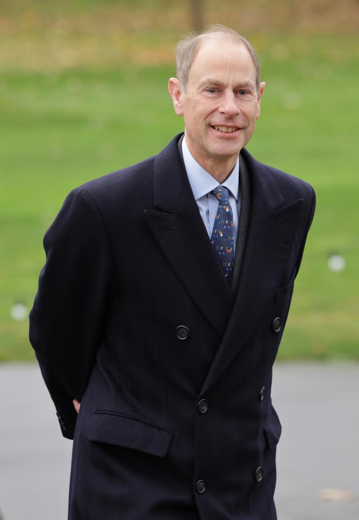 Prince Edward smiles in suit