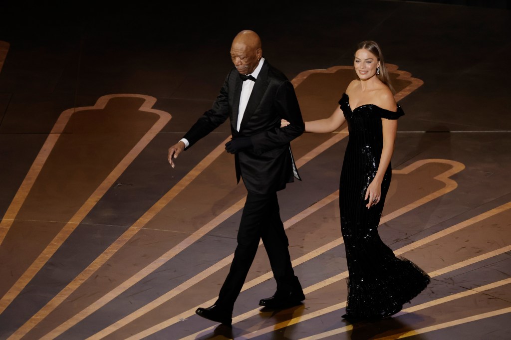 Margot Robbie and Morgan Freeman onstage at the 2023 Oscars.