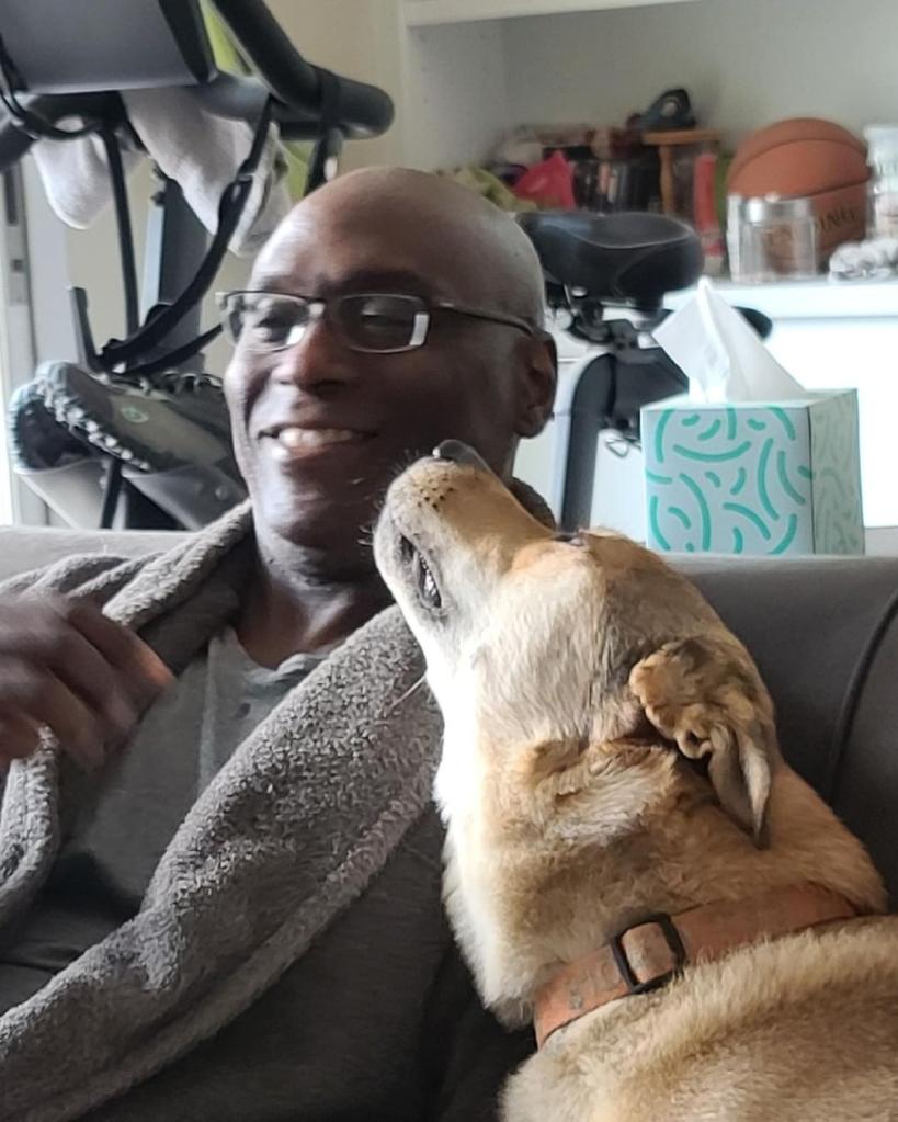 Lance Reddick with one of his dogs.