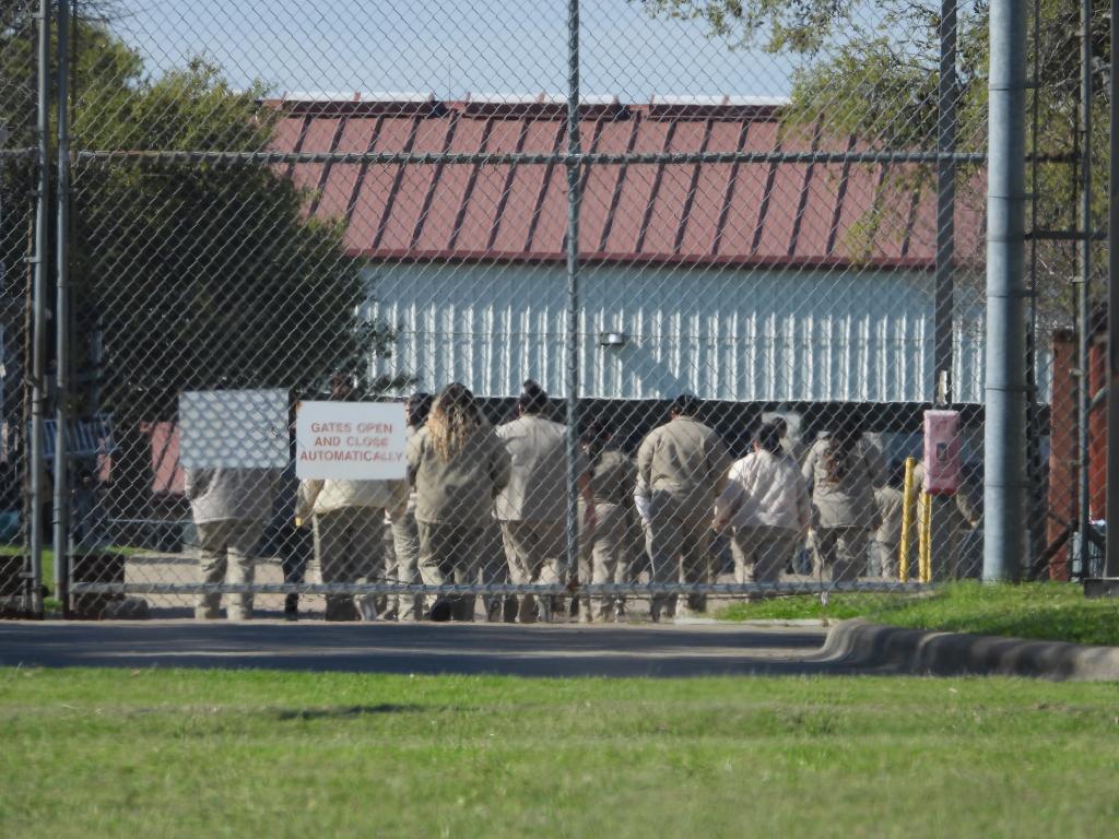 prisoners in a field