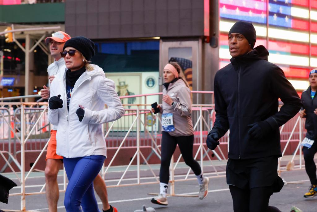 Amy Robach and TJ Holmes running the New York City Half Marathon