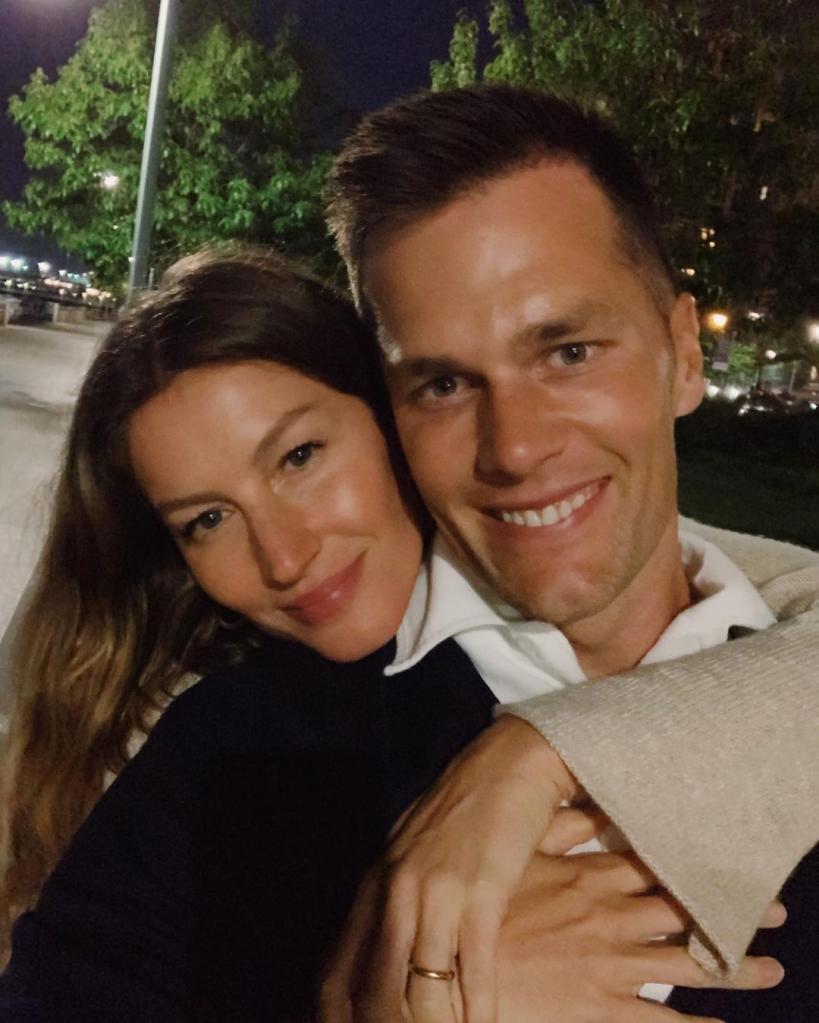 Gisele Bündchen hugs Tom Brady