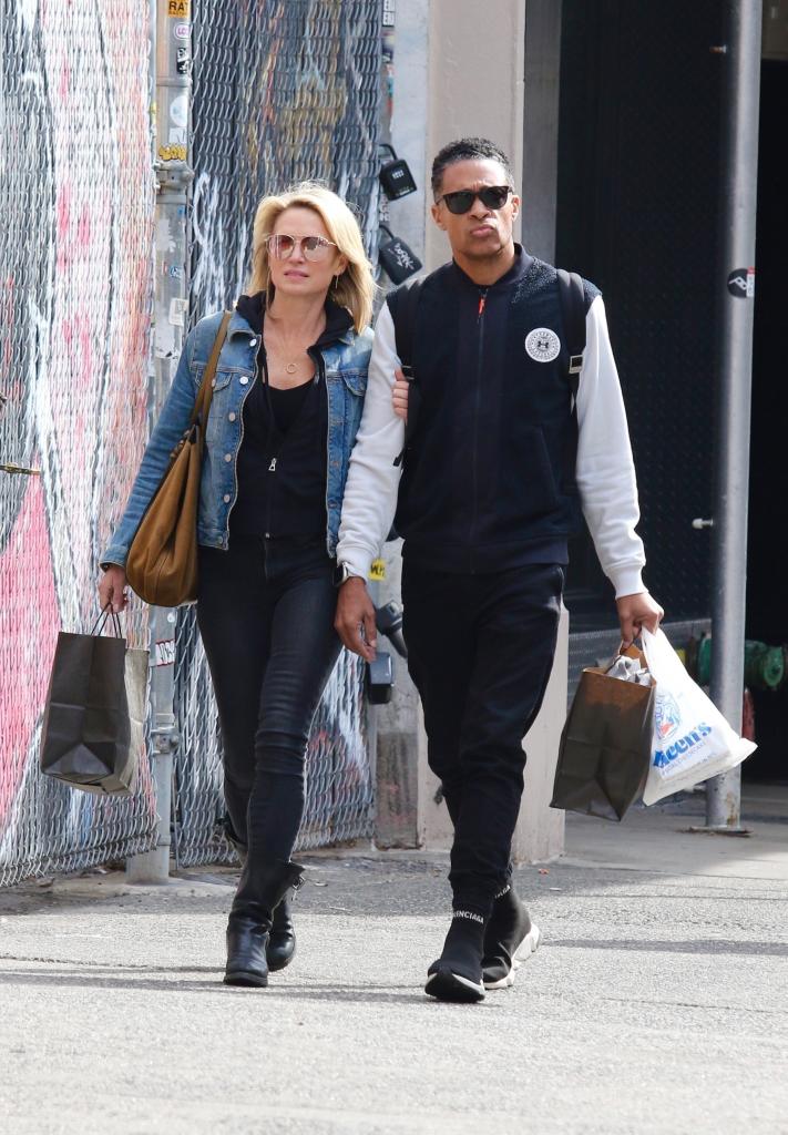 Amy Robach and TJ Holmes walking in NYC