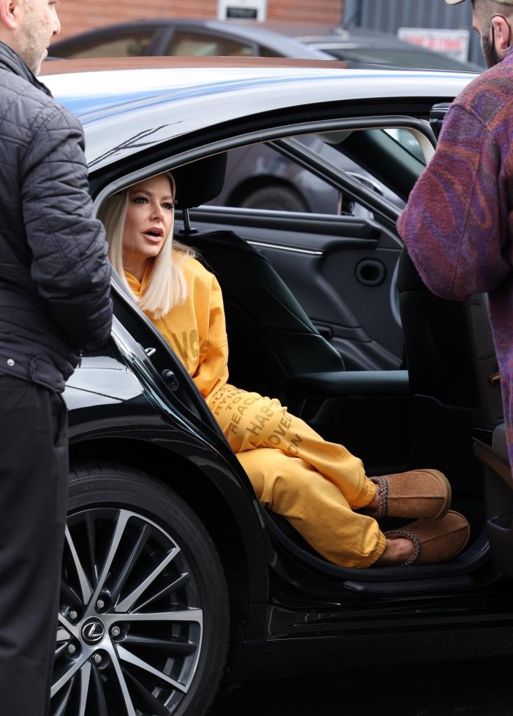 ariana madix sitting in a car