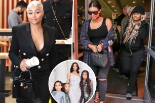 Blac Chyna wears black, split with the model walking with Kim Kardashian, as well as a family photo