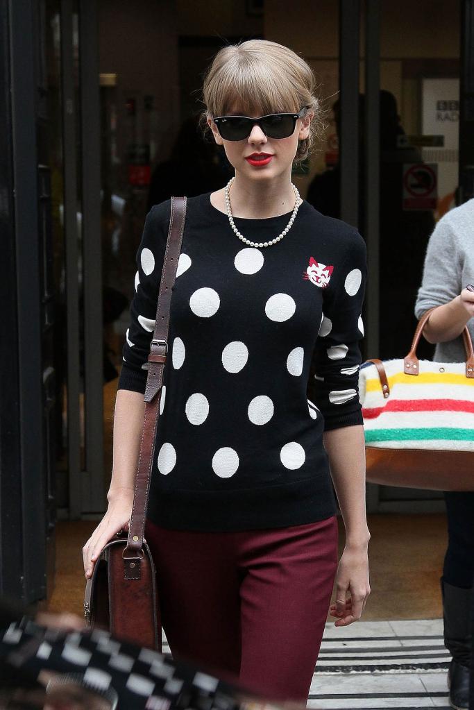 Taylor Swift wearing a polka-dot sweater