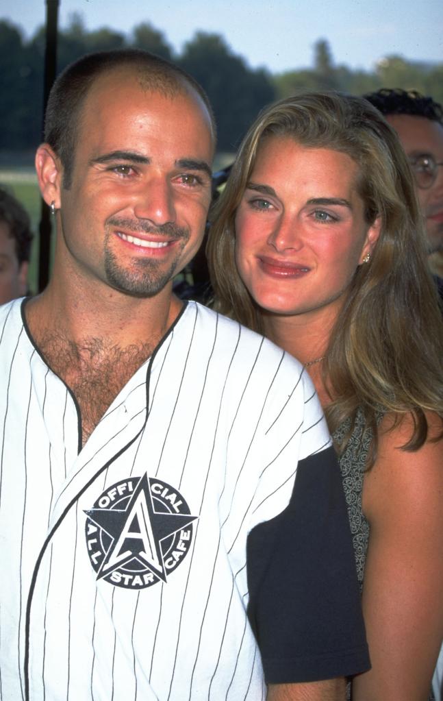 Andre Agassi and Brooke Shields posing together.