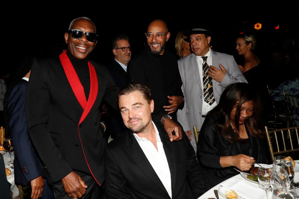 Leonardo DiCaprio, O.G. Jabar and Swizz Beatz with friends at a dinner.