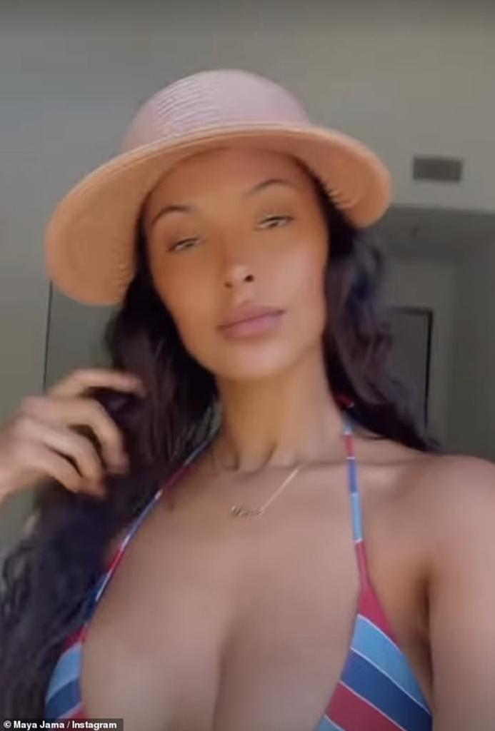 Maya Jama wearing a "Leo" necklace.