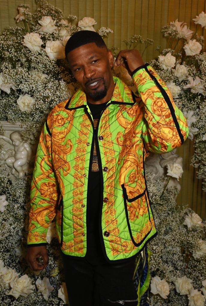 Jamie Foxx poses in colorful shirt