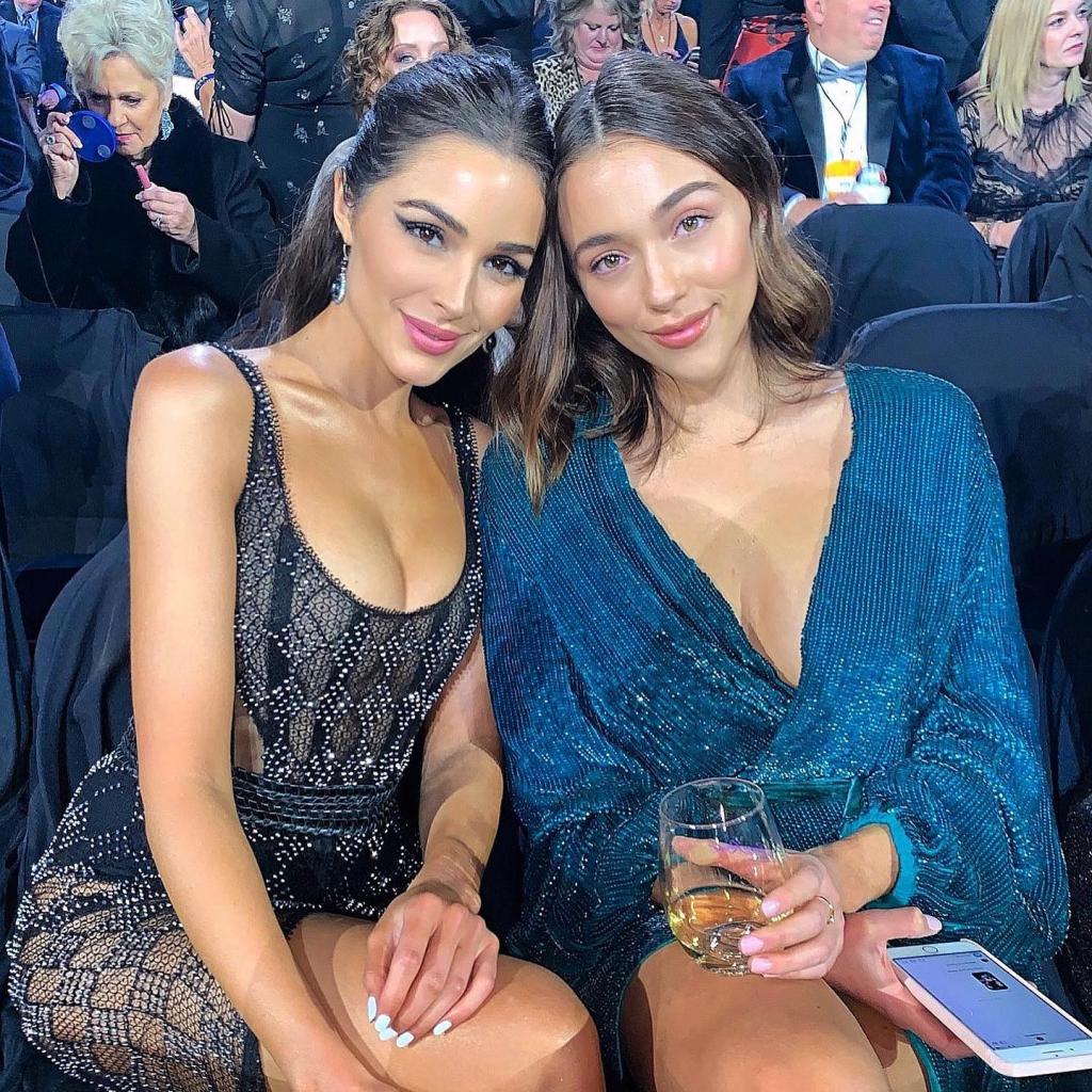 Sophia and Olivia Culpo sitting together.