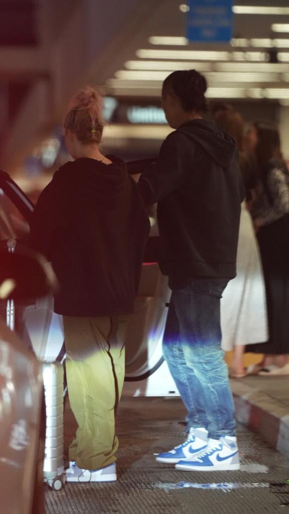 Ariana Madix and Daniel Wai at the airport.