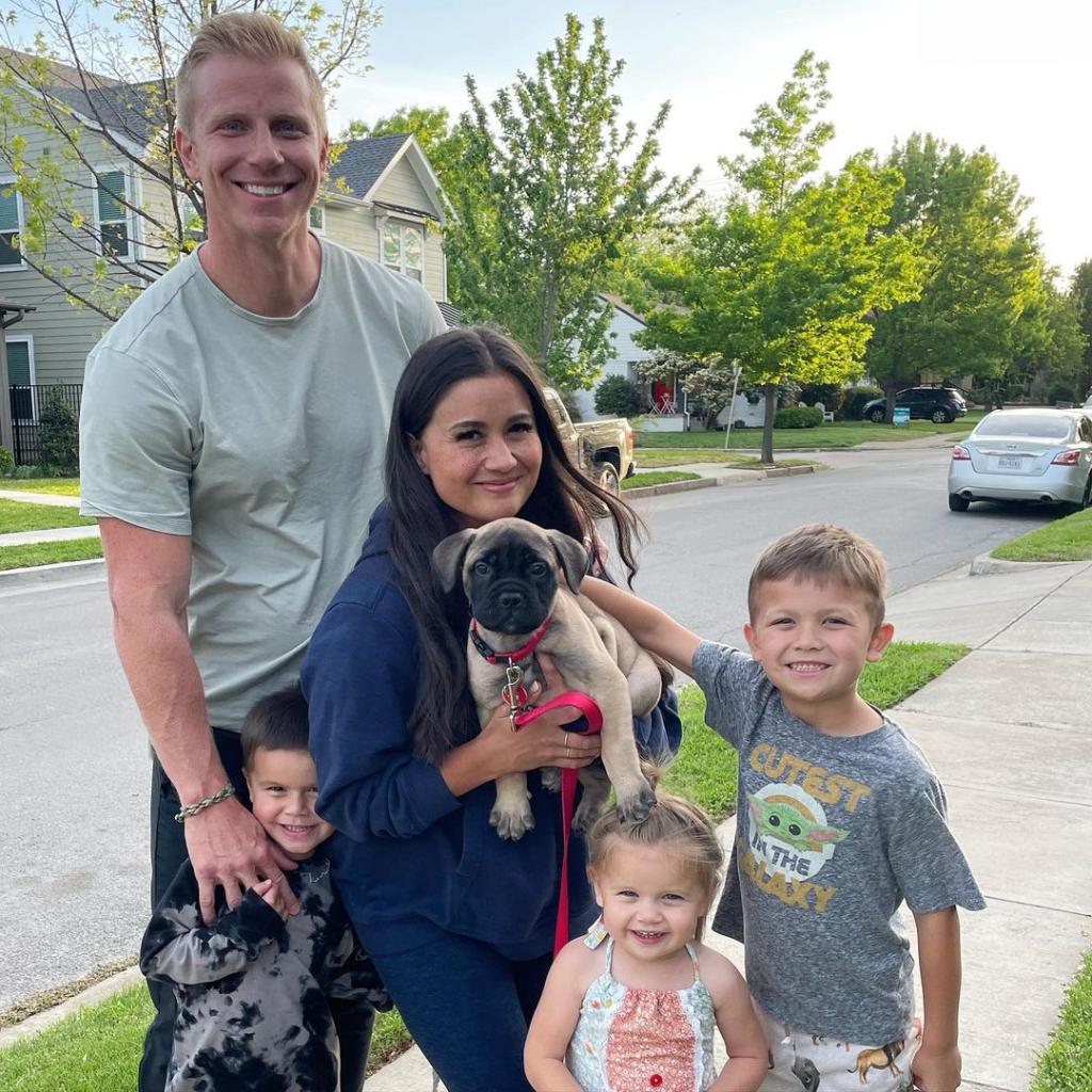 Sean Lowe and Catherine Lowe pose with three kids and son Gus