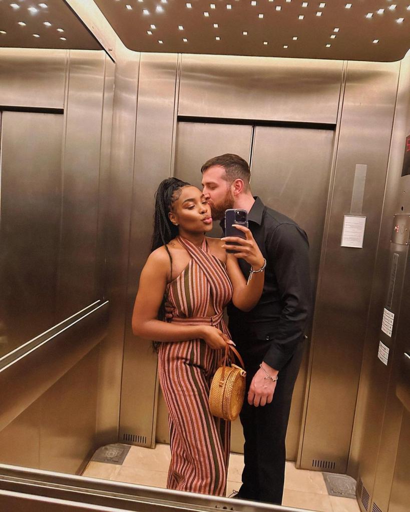 cameron hamilton and lauren speed selfie on an elevator