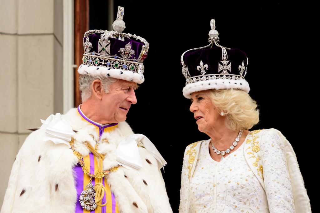 King Charles III and Queen Camilla wearing their crowns.