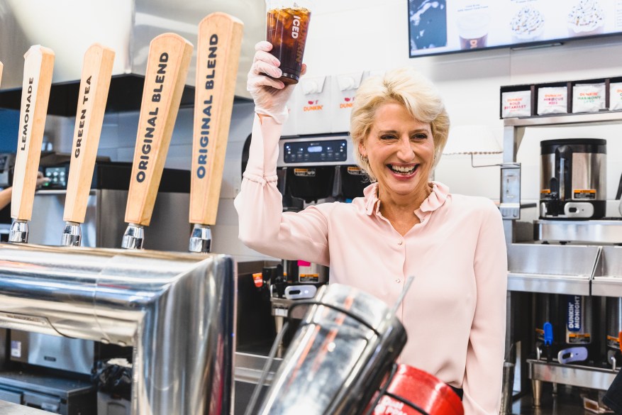 Dorinda Medley Works the Tap in Support of the Dunkin’ Joy in Childhood Foundation on Dunkin’ Iced Coffee Day