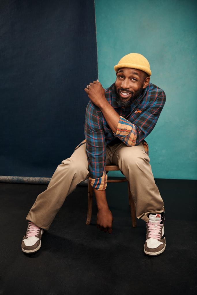 Stephen “tWitch” Boss  smiling in yellow beanie