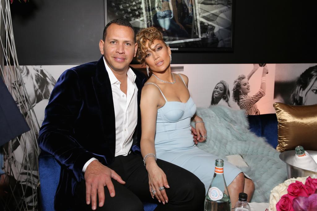 Alex Rodriguez and Jennifer Lopez sitting together