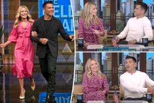 Kelly Ripa and Mark Consuelos walk onstage, split with the couple sitting on set