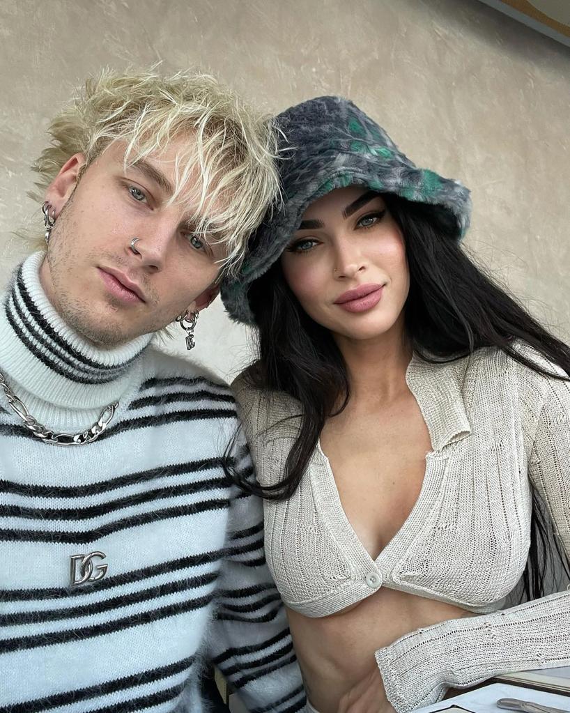 Megan Fox and Machine Gun Kelly posing together.