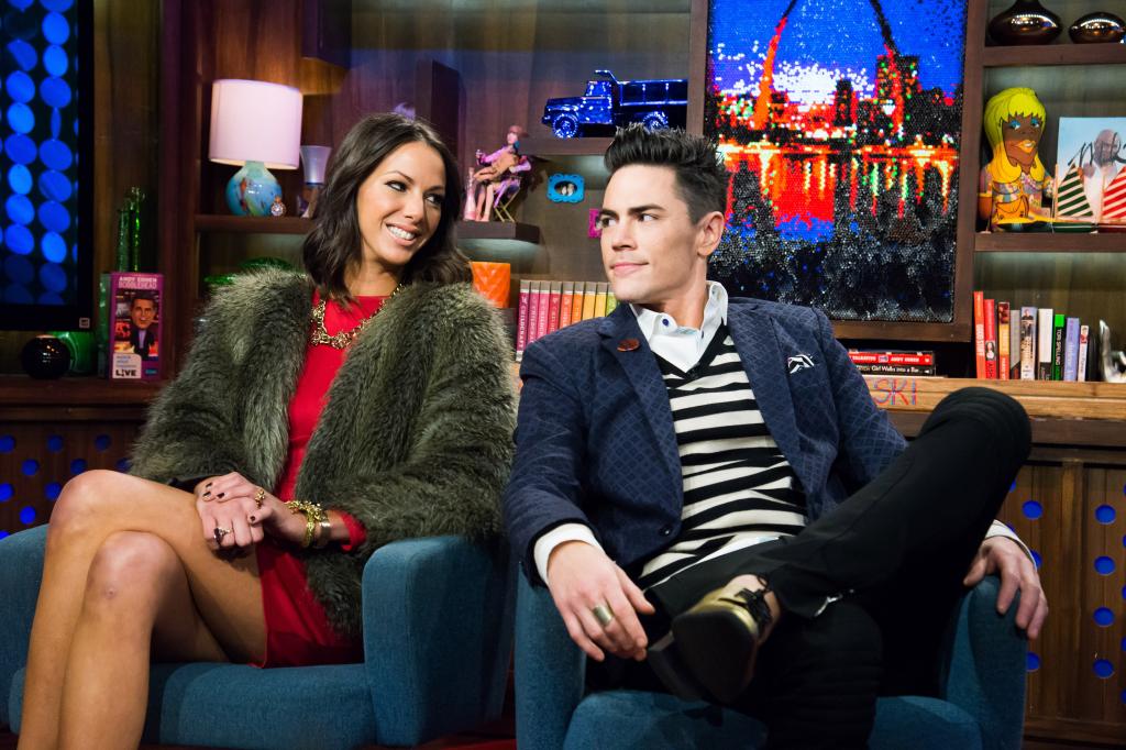 Kristen Doute sits beside Tom Sandoval