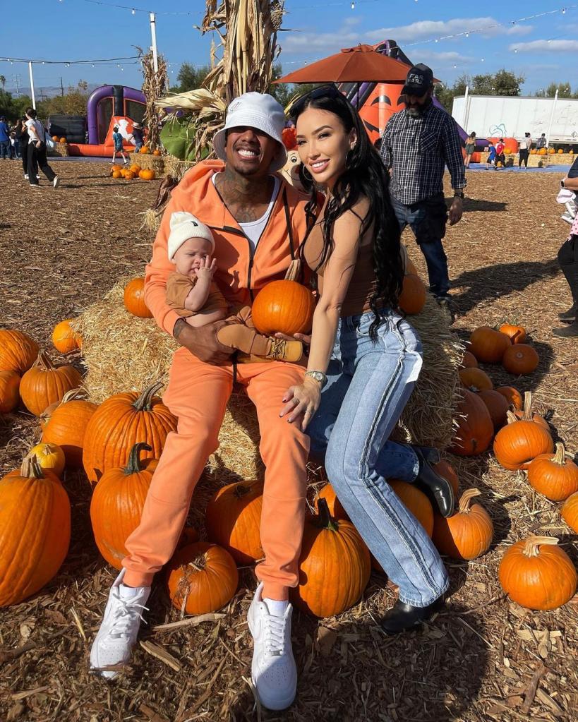 Nick Cannon and Bre Tiesi at the pumpkin patch with their son.