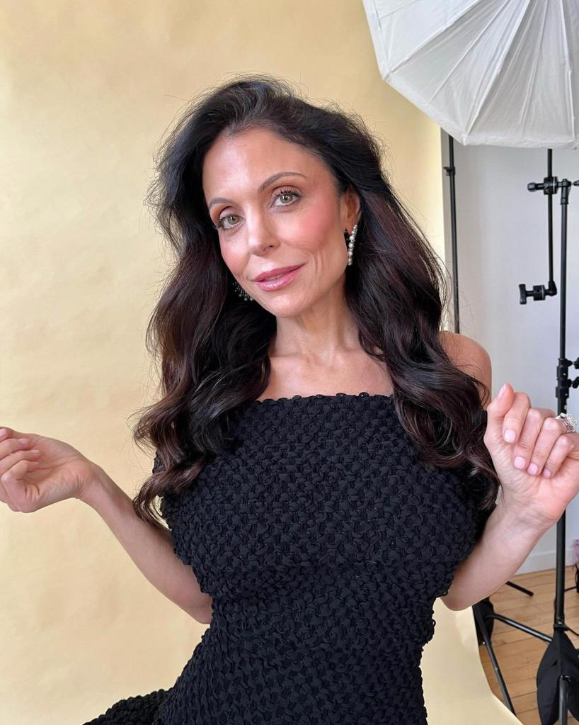 Bethenny Frankel poses in black top