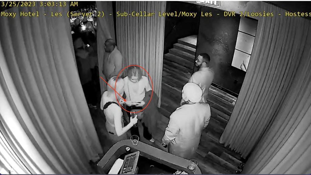 A still of video surveillance of Jonathan Majors' ex-girlfriend at the club.