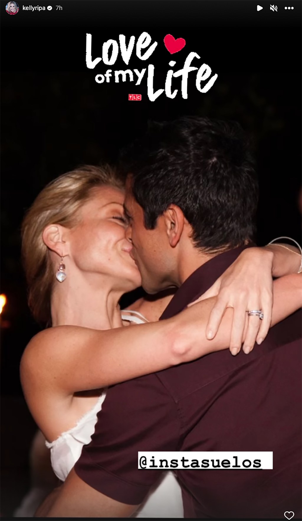 Kelly Ripa Kissing Mark Consuelos. 