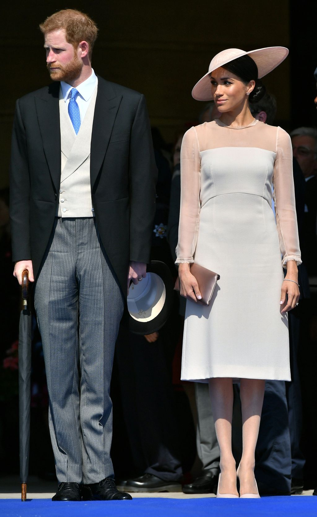 Prince Harry and Meghan Markle standing together.