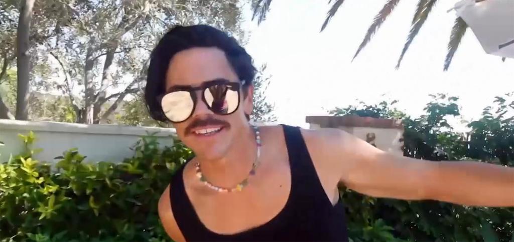 Tom Sandoval smiling in sunglasses.