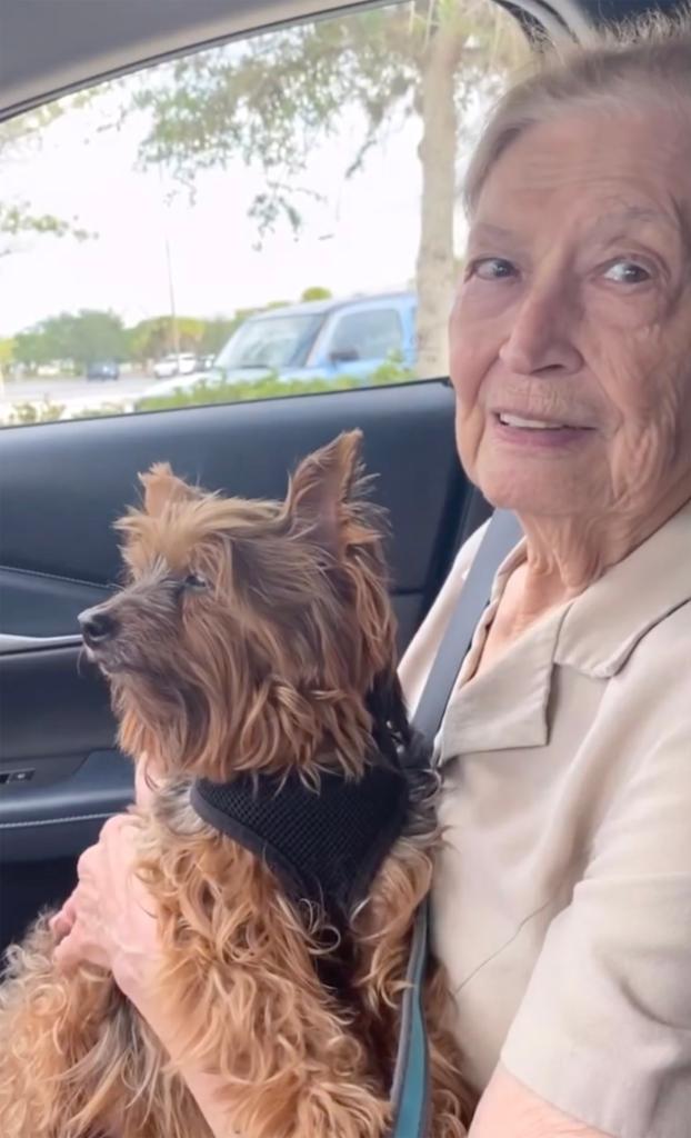 Ariana Madix's grandma holding a dog.