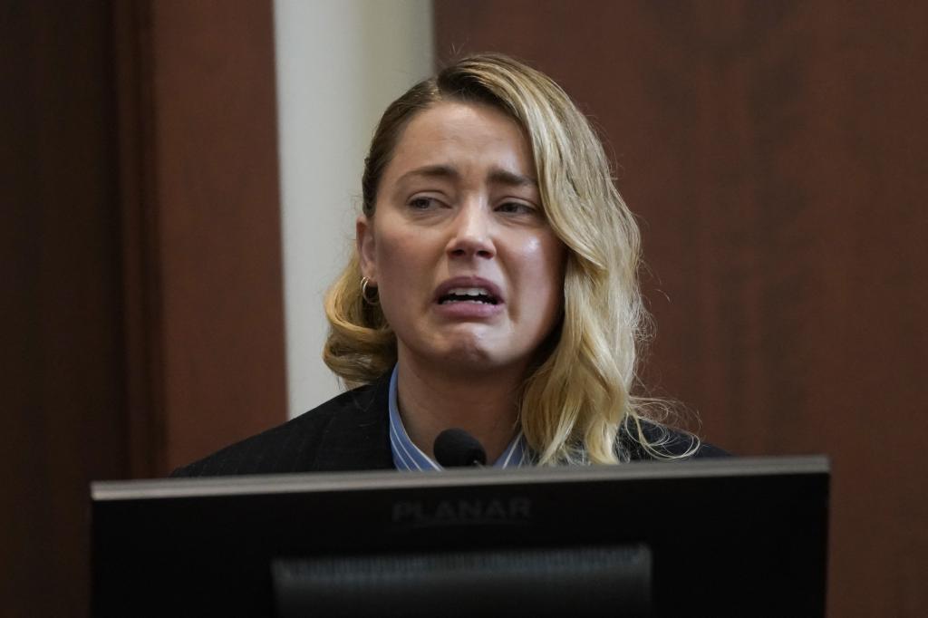 Amber Heard crying in court.