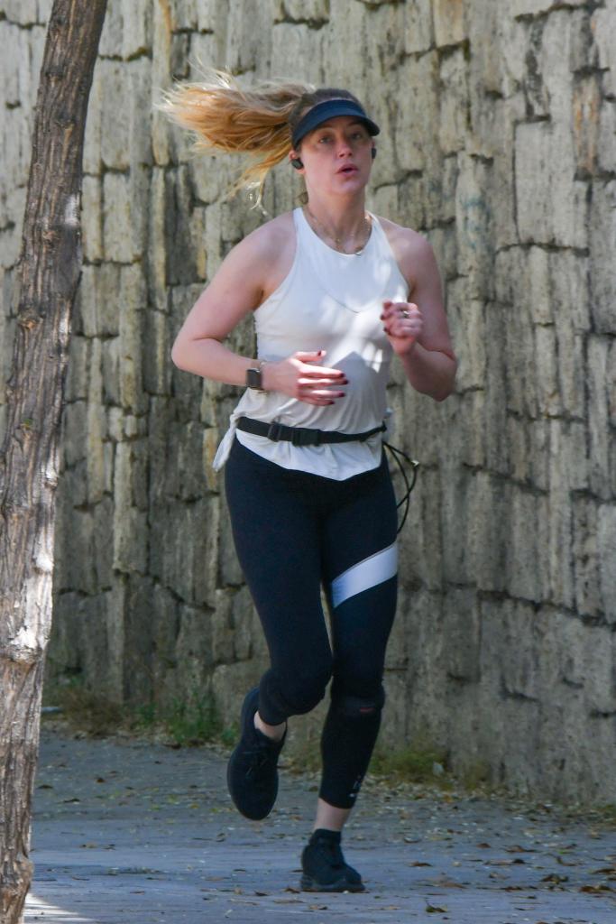 Amber Heard running in Spain.