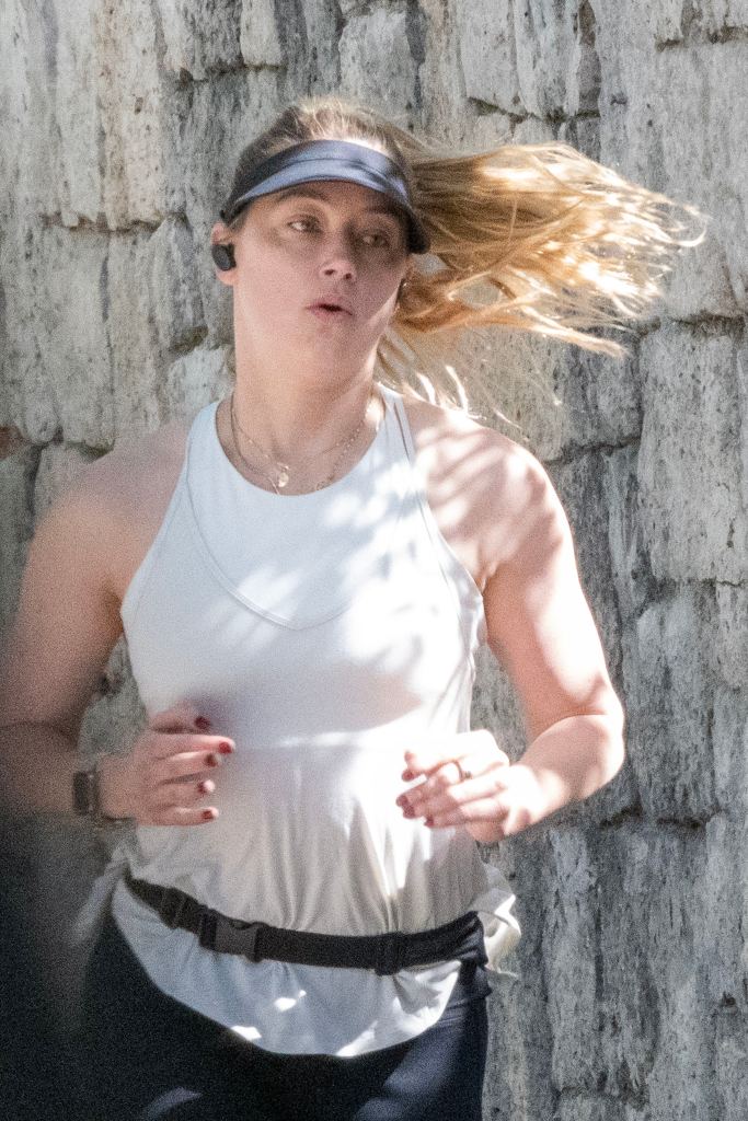 Amber Heard goes for a run in Spain.