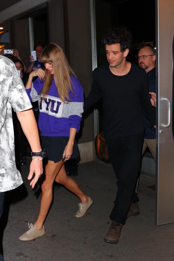 Taylor Swift walks with Matty Healy