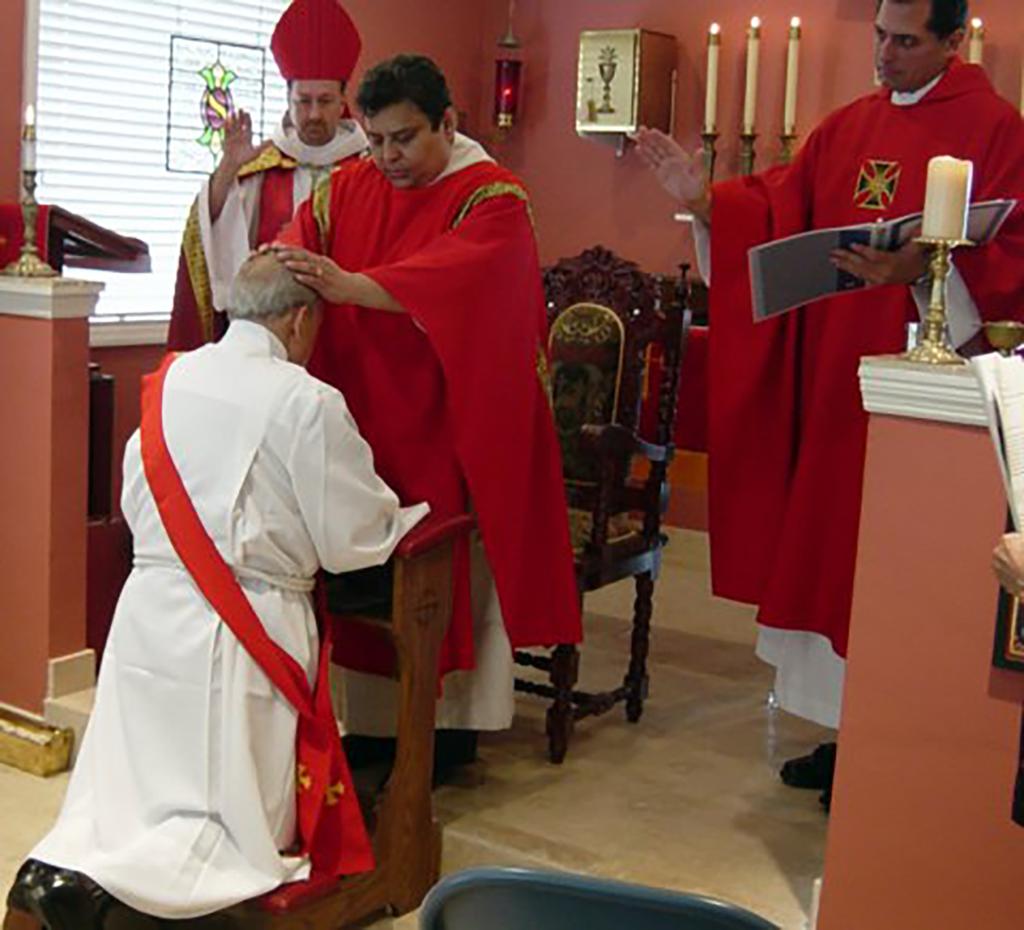 Ken Rosato working as a priest during a ceremony.