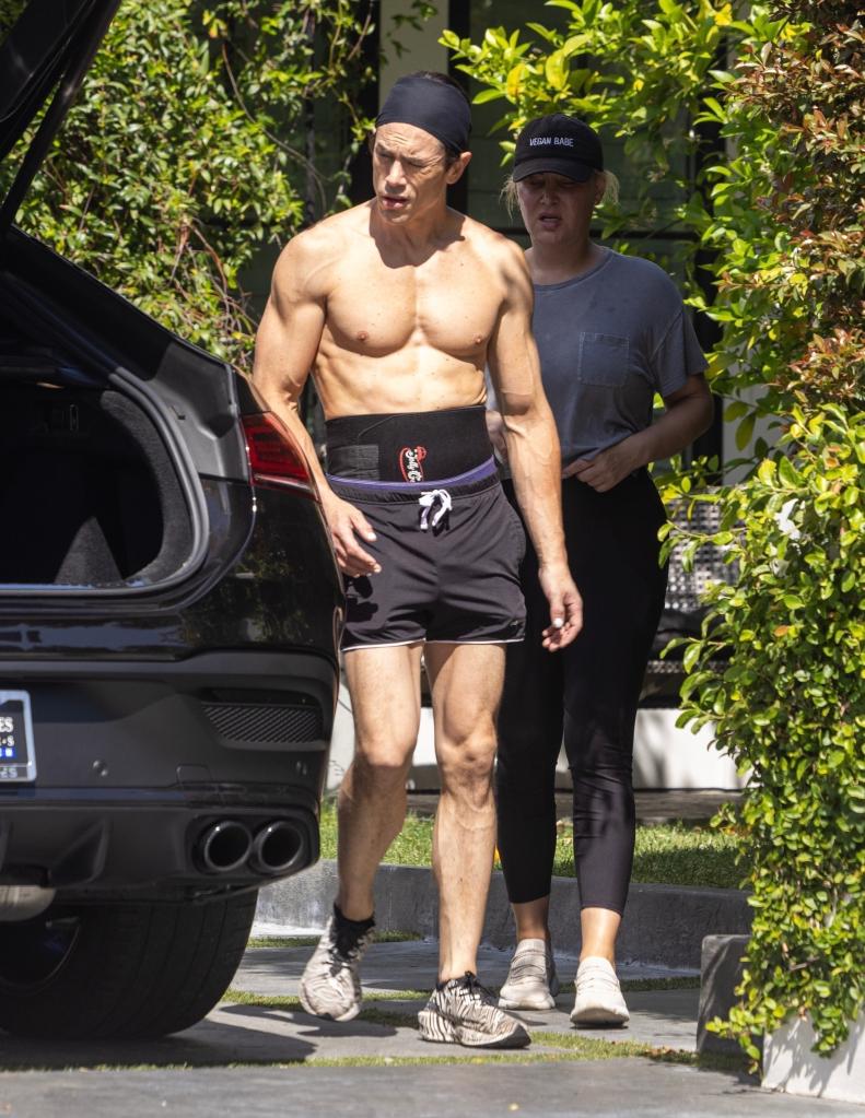 Tom Sandoval and Raquel Leviss standing outside 