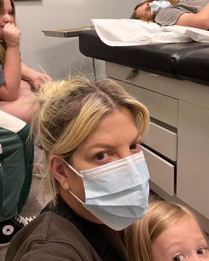 Tori Spelling at urgent care with kids