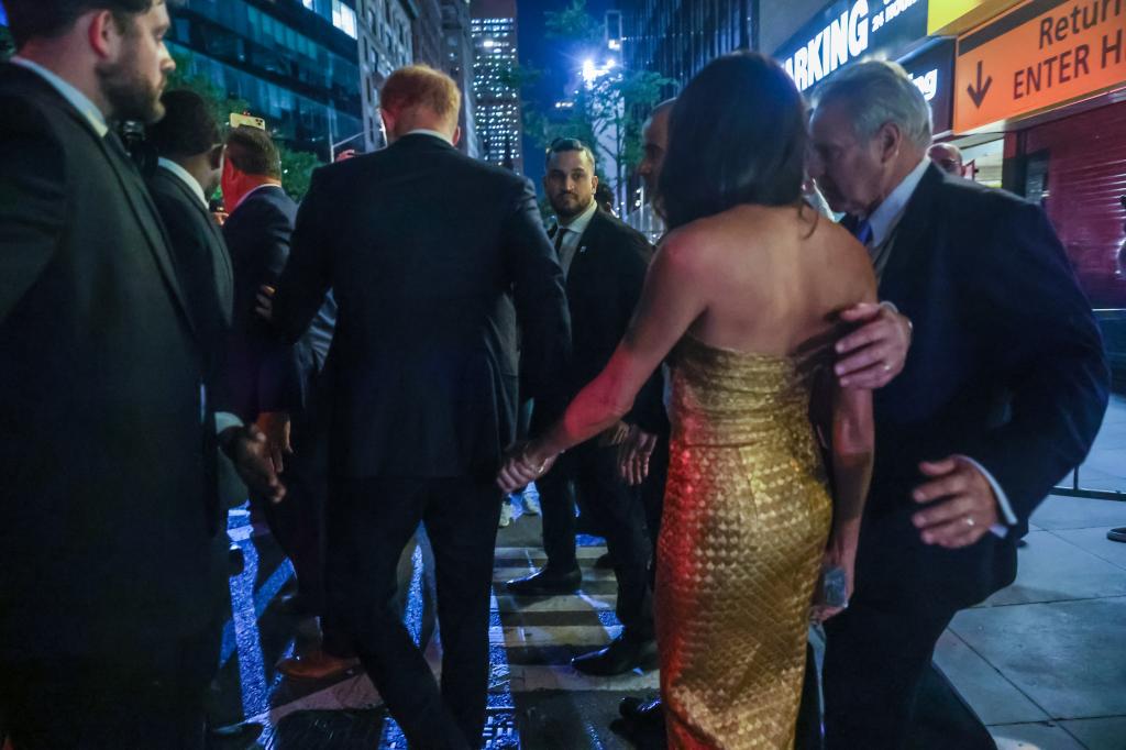 Meghan Markle and Nick Cannon hold hands after Women in Vision Awards