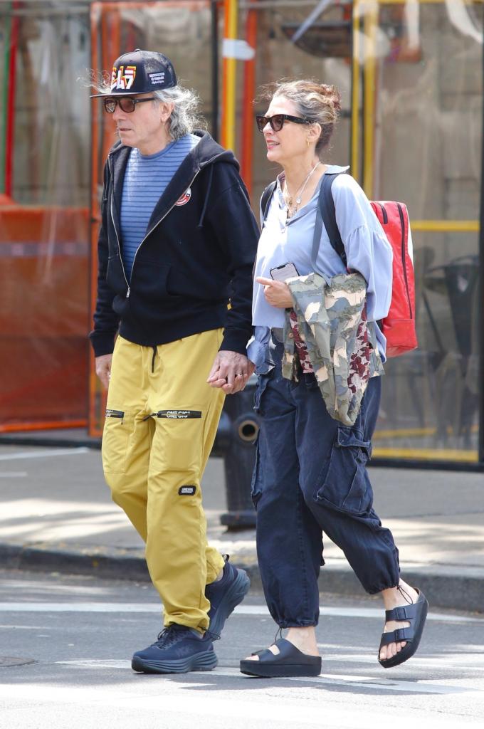 Daniel Day-Lewis walks with Rebecca Miller