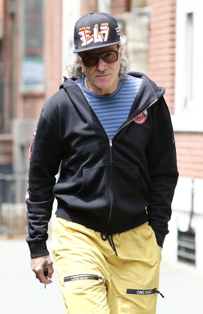 Daniel Day-Lewis walks in casual attire