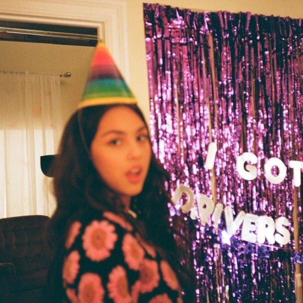 Olivia Rodrigo in a party hat